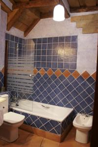 Un baño de Posada La Gatera