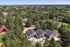 an aerial view of a house in the woods at BV234-Blavand-Pouls-Bjerge-14 in Blåvand