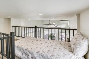 a bedroom with a bed on a balcony at Great Outdoor Space! Serene Getaway in Oakland in Oakland