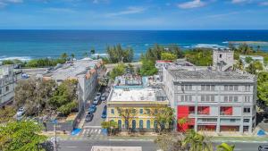 an aerial view of a city with the ocean at Boho Oasis by the Beach in San Juan
