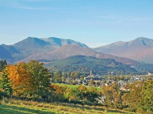 a town in a valley with mountains in the background at Garries Cottage in Bassenthwaite +2 photos