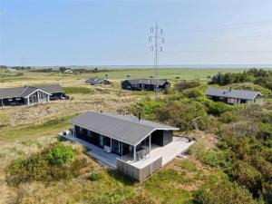 an overhead view of a house in a field at 208-Ringkobing-Fladsbjergvej-226 in Klegod