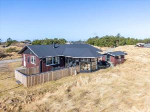 an aerial view of a house in a field at 280-Ringkobing-Klitsvinget-11 in Klegod