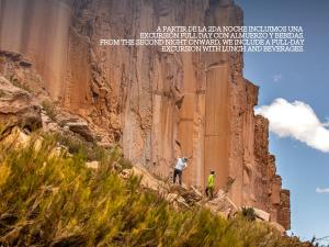 a man standing on top of a mountain at Salinas Grandes Jujuy - Pristine Luxury Camp in Salinas Grandes