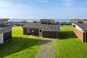 an aerial view of a house with green grass at FY293-Faaborg-Mosegarden-42 in Faaborg