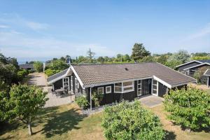 an aerial view of a house with trees at FY287-Faaborg-Siovej-12 in Faaborg
