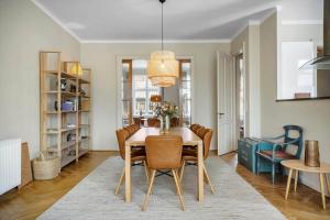 a dining room with a table and chairs at FY399-Bogense-Ostergade-5-a in Bogense