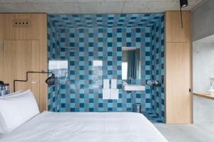 Letto o letti in una camera di Placid Hotel Design & Lifestyle Zurich