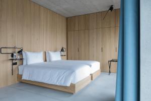 Letto o letti in una camera di Placid Hotel Design & Lifestyle Zurich