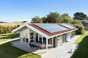 a house with solar panels on the roof at 84266-Knebel-Toplaerkevej-1 in Knebel