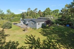 an aerial view of a house with a yard at 30383-Odder-Lyngbakkevej-10 in Odder
