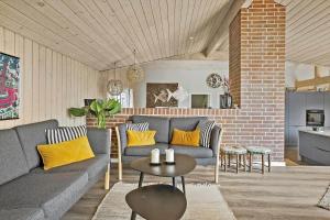 a living room with a couch and a table at 30465-Odder-Stakket-Torn-9 in Odder