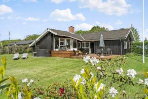 a home with a large yard with a house at 30465-Odder-Stakket-Torn-9 in Odder