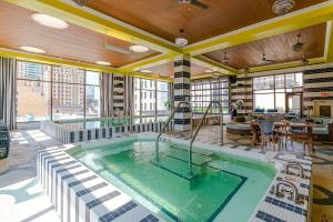 a large indoor swimming pool in a building at 2 BHK Unit In Core Downtown Cincy in Cincinnati