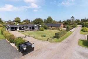 an aerial view of a house with a driveway at 30461-Odder-Hulager-6 in Odder