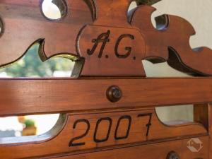 a wooden table with a number on it at Landhaus Gruden Sommerberg in Bad Wildbad