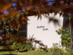 a sign on the side of a building at Landhaus Gruden Sommerberg in Bad Wildbad +58 photos
