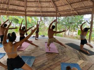 a group of people in a yoga class at Love Harmony Union Sanctuary in El Nido +53 photos