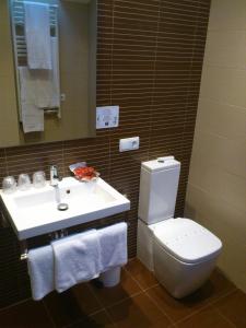 Koupelna v ubytování Hotel Alda Entrearcos