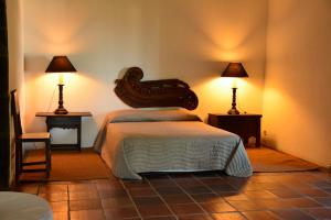 Uma cama ou camas num quarto em Convento de São Francisco