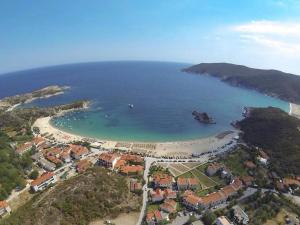 an aerial view of a beach and the ocean at Eden's Garden Kalamitsi in Kalamitsi +7 photos