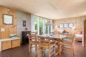 a dining room with a table and chairs at 1601-Melby-Muldbjergvej-1 in Melby