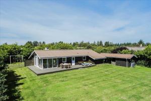a large house with a large yard in front of it at 40703-Ulfborg-Helmklit-227 in Ulfborg