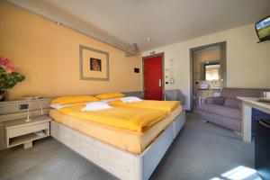 Postel nebo postele na pokoji v ubytování Hotel Marzia