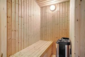 a wooden sauna with a trash can in it at 30859-Ulfborg-Bellisvej-432 in Ulfborg