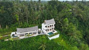 an aerial view of a house in the forest at Jungle Valley Villas in Susut