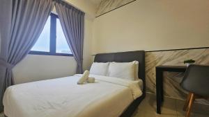 a bedroom with a white teddy bear sitting on a bed at Setia Alam Edu Sentral # JSA Walking Distance # Setia Convention Centre & Setia City Mall in Setia Alam +79 photos