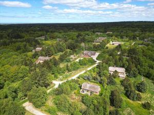 an aerial view of a house in the forest at 10808-Ulfborg-Vester-Mosevej-84 in Ulfborg