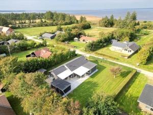 an aerial view of a house with a yard at 30789-Ulfborg-Akelejevej-276 in Ulfborg