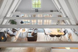 an overhead view of a living room with chairs and a table at 20362-Ulfborg-Sortebaervej-22 in Ulfborg
