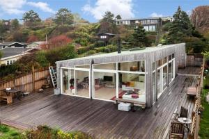 a tiny house on top of a wooden deck at SL287-Slagelse-Strandvaenget-14 in Slagelse
