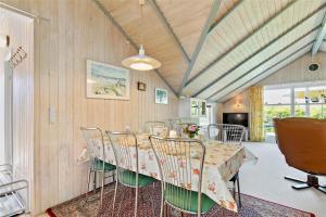 a dining room with a table and chairs at K20031-Kalundborg-Kystagervej-29 in Kalundborg +18 photos