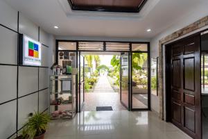 an entrance to a house with an open door at Pietros Square in Butuan