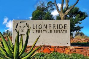 a sign for the lompoc life style estate at Private Room in a 2-Bed Apartment Shared in Farmall