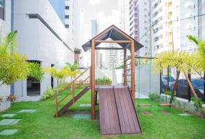 a playground in the middle of a city at FLAT LUXO em BOA VIAGEM Prox PRAIA, SHOPPING e AEROPORTO in Recife
