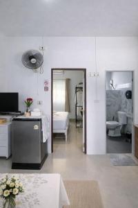 a room with a room with a bed and a mirror at Yada House s&h in Nai Yang Beach +47 photos
