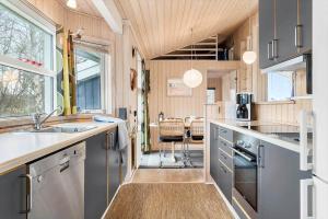a kitchen with a sink and a counter at 20411-Samso-Nylandsvej-21-C in Ballen