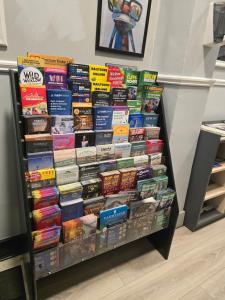 a book shelf filled with lots of books at KGT House in Dublin