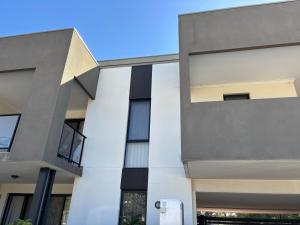 an exterior view of a building at Courtyard apartment in Perth