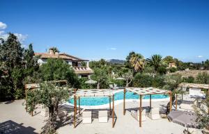 a view of a swimming pool with a resort at NOHA Lifestyle Hotel - Adults Only in Pula