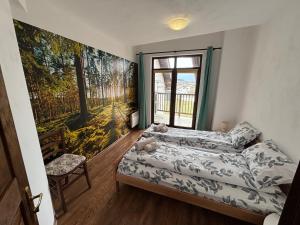 a bedroom with two beds and a window at Villa Detelina near the Bansko Ski Resort with Jacuzzi in Razlog +13 photos