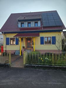 a house with solar panels on top of it at Morgensonne in Lahr