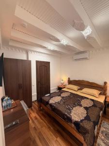 a bedroom with a bed in a room at GUZAL Boutique Hotel in Bukhara +97 photos