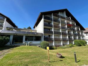 a building with a sign in front of it at Ferienwohnung Naturgenuss in Oy-Mittelberg