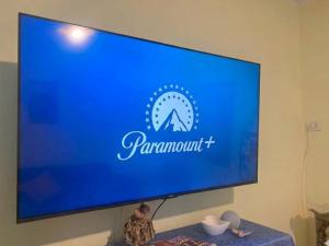 a large flat screen tv on a wall at Villa Colline Fiorite in Putignano