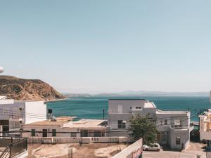 a view of the ocean from a building at Chris&C Apartments in Agia Galini